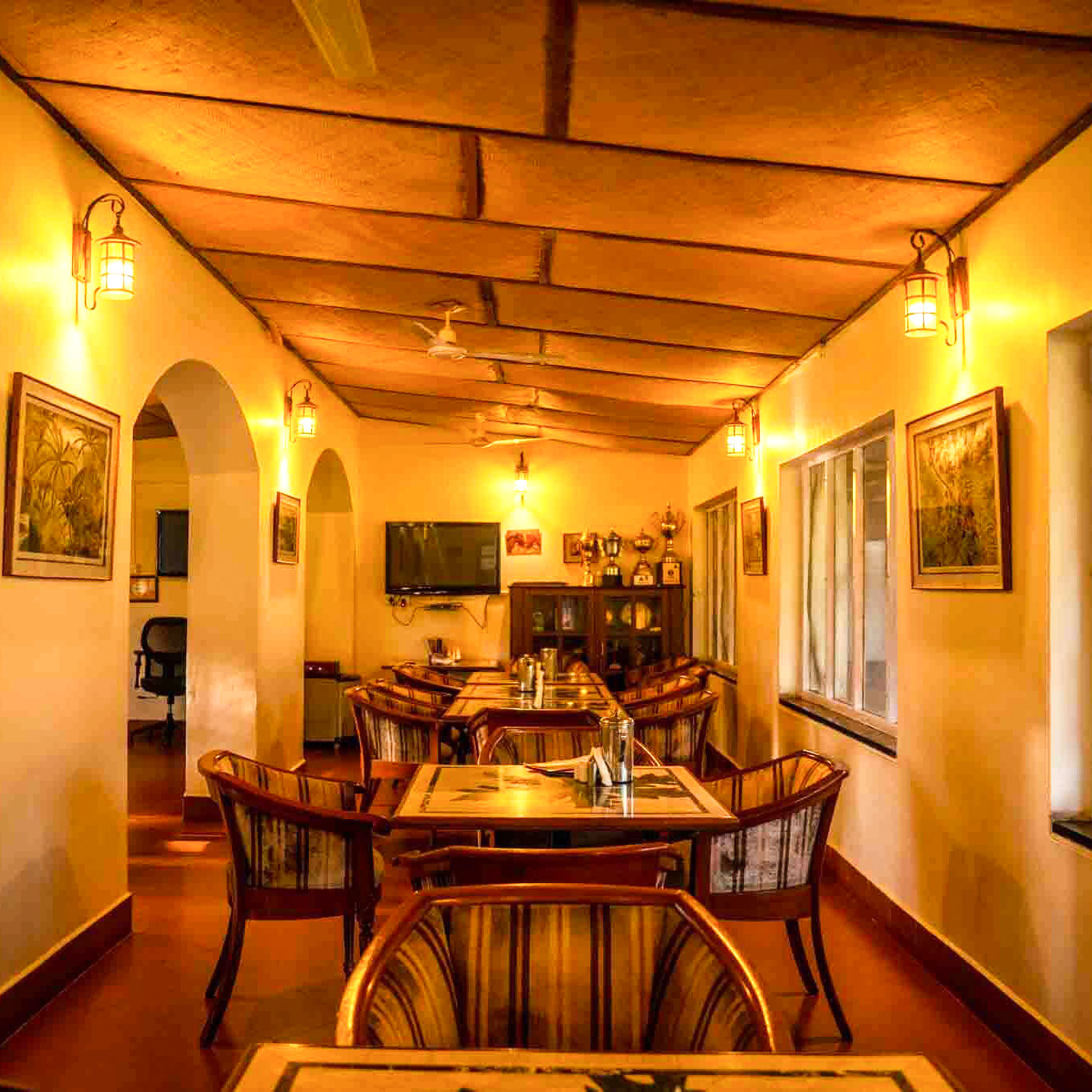 Unwind at a cafe overlooking the stables lawns.